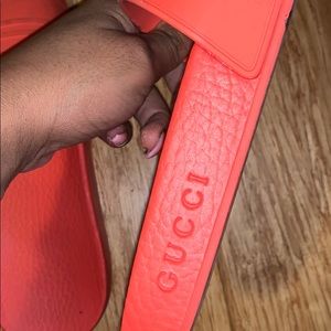 Women’s Gucci rubber slides